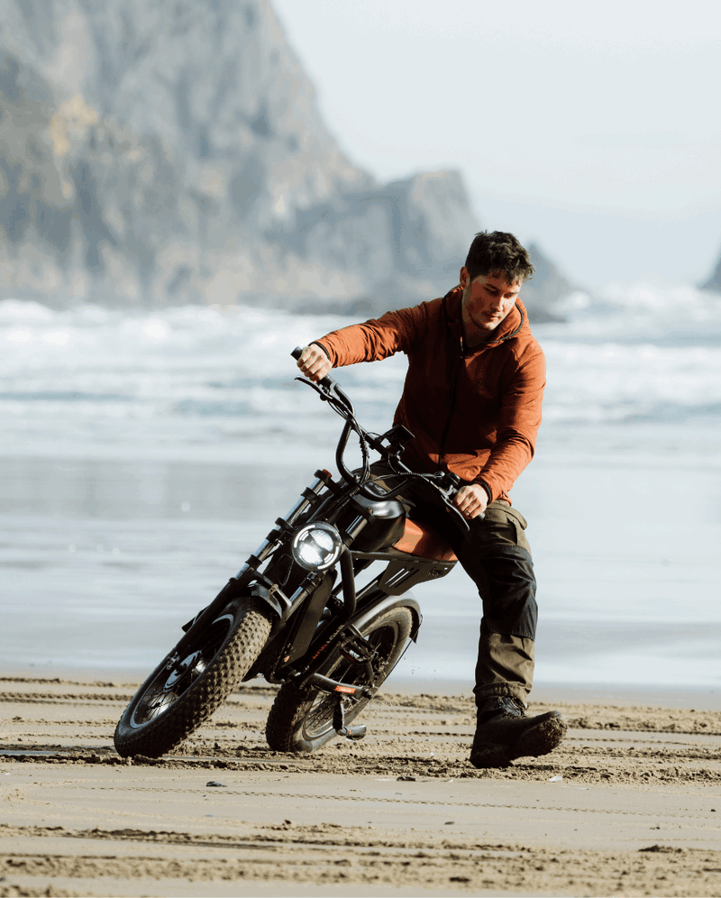 Rider turning on Freego F3 Pro Max on sandy beach