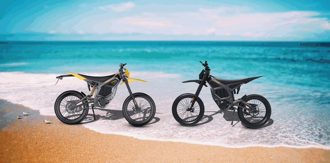 Nova 5 and Nova 5 Pro face-to-face, parked on a beach with ocean in the background