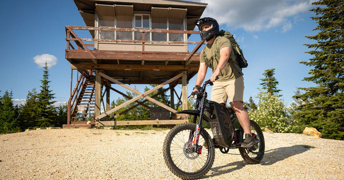 Rider operating an all-terrain emoto on a rugged dirt trail in Off-Road Mode.