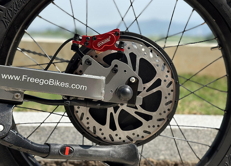 FOUR-PISTON BRAKE SYSTEM