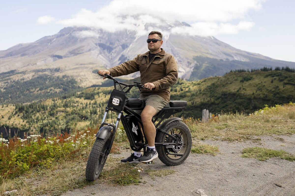 Man riding a Freego-F2-pro-max in a mountainous landscape