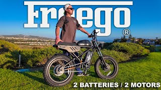 A man standing with a Fnego electric bike against a coastal landscape