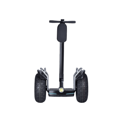 Black Segway-style personal transporter on a gray background
