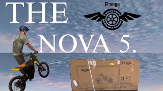 A rider on Nova 5 next to its branded cardboard box