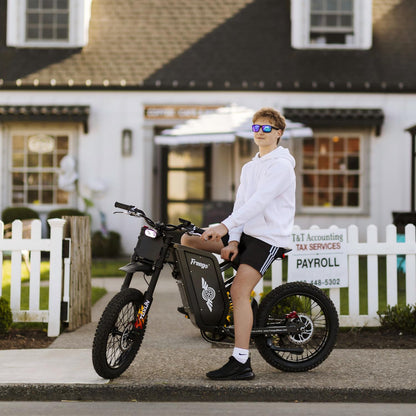 Freego X1 SE ridden on a suburban street by a rider wearing casual clothing.