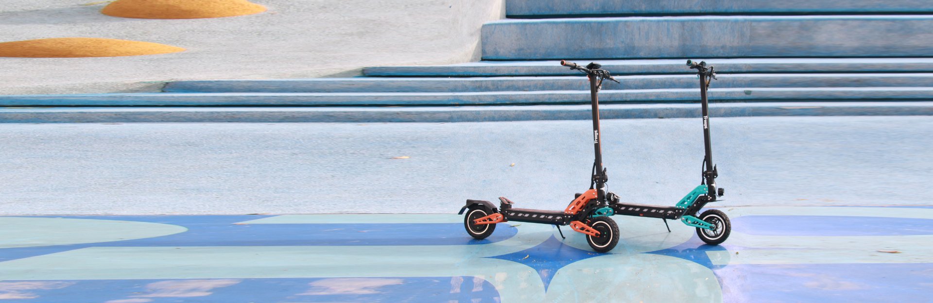 Freego C10 and C10 Pro electric scooters side by side in an outdoor setting
