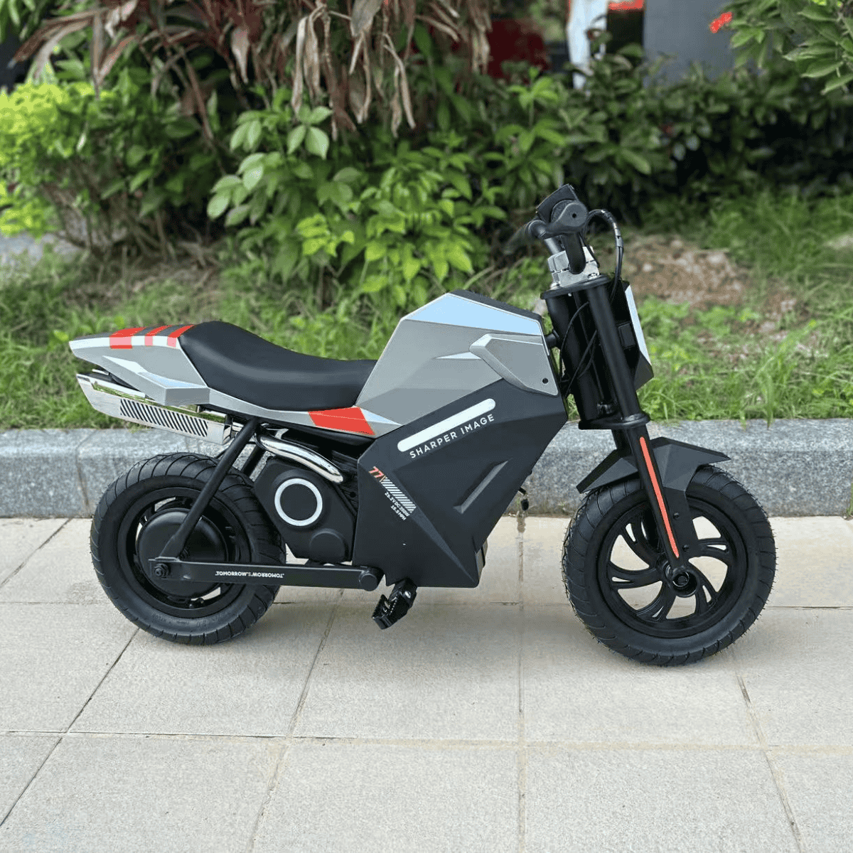 Freego K1 electric motorbike for kids placed outdoors