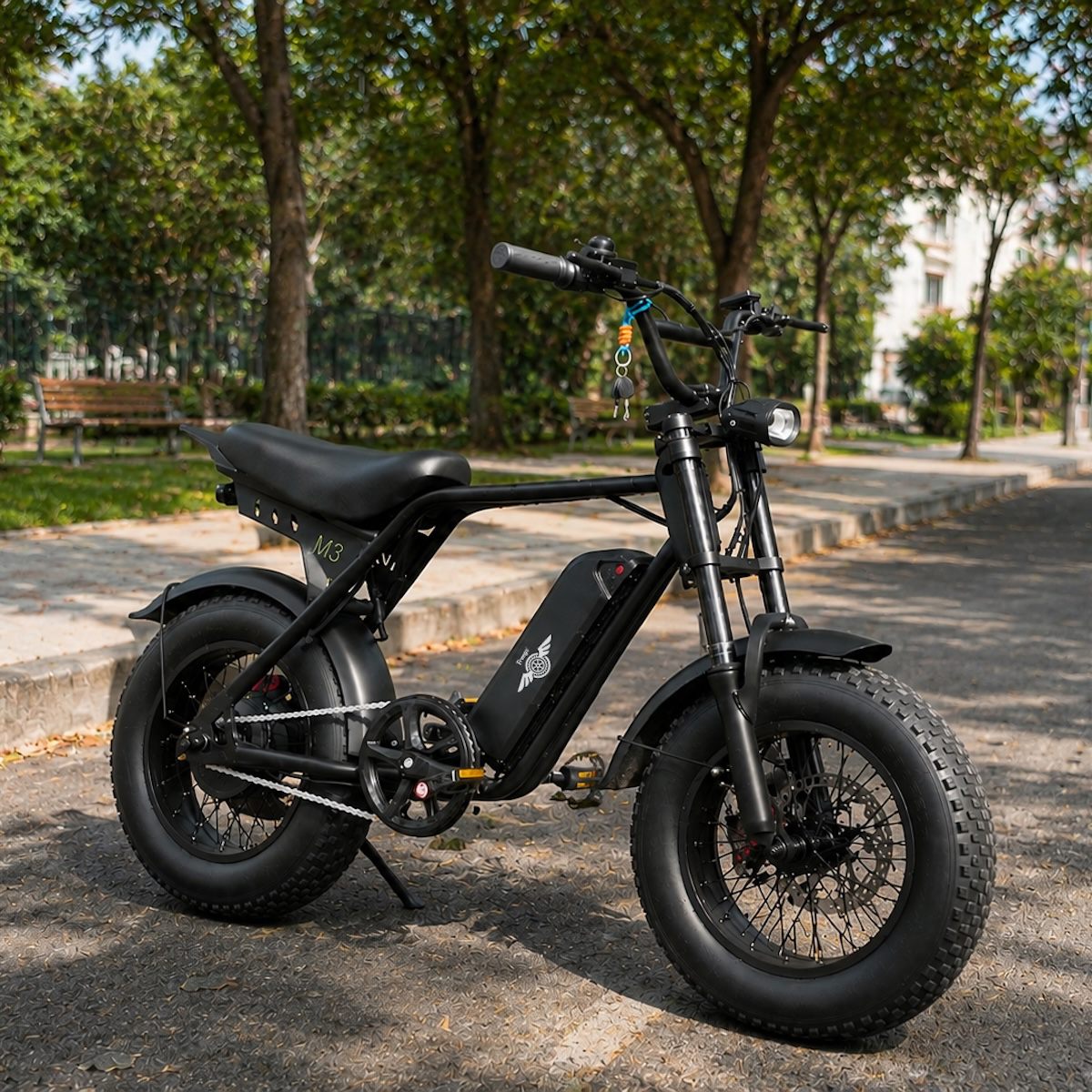 Freego M3 fat tire e-bike parked on a shaded path in the park