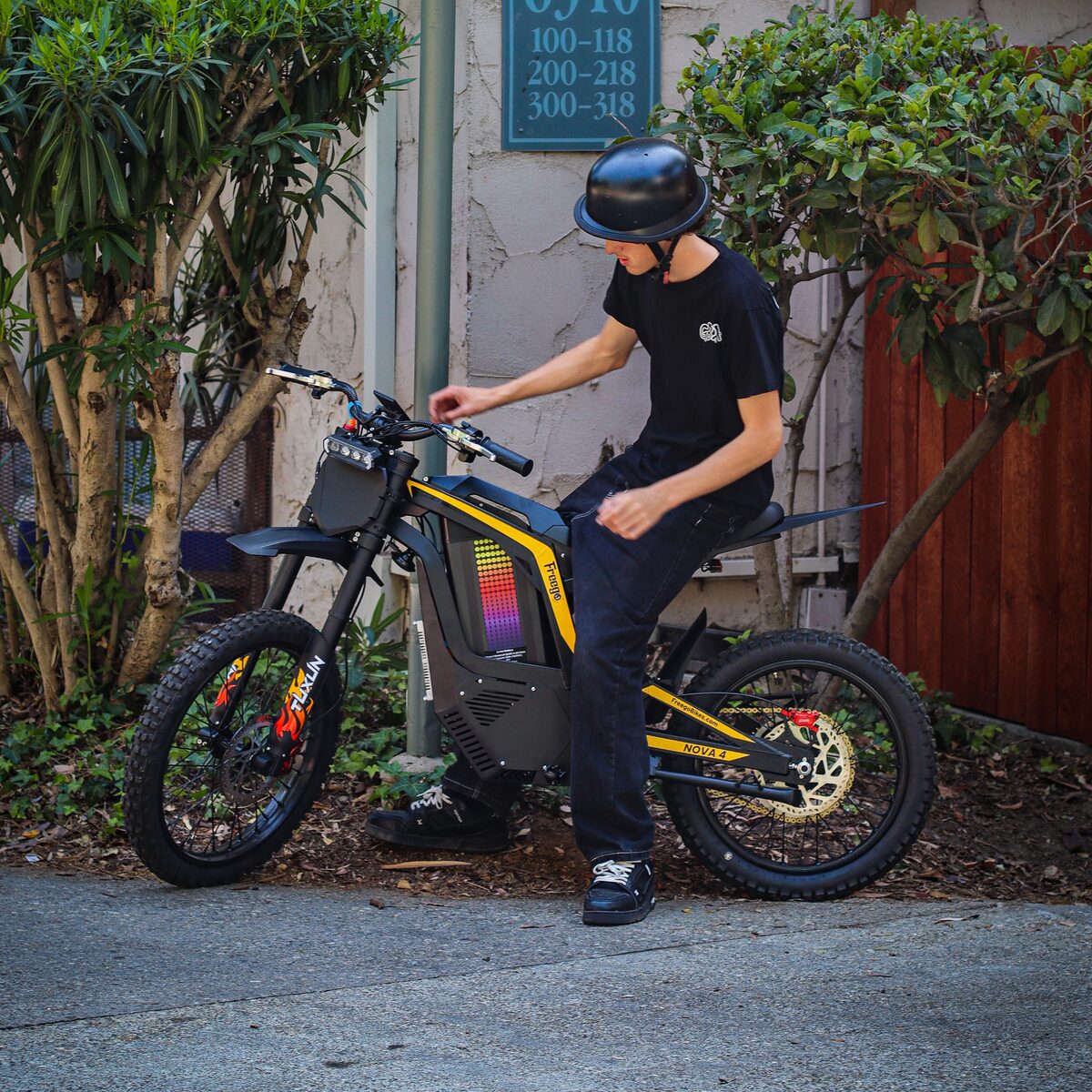 Freego Nova 4 electric bike street 
shot with rider
