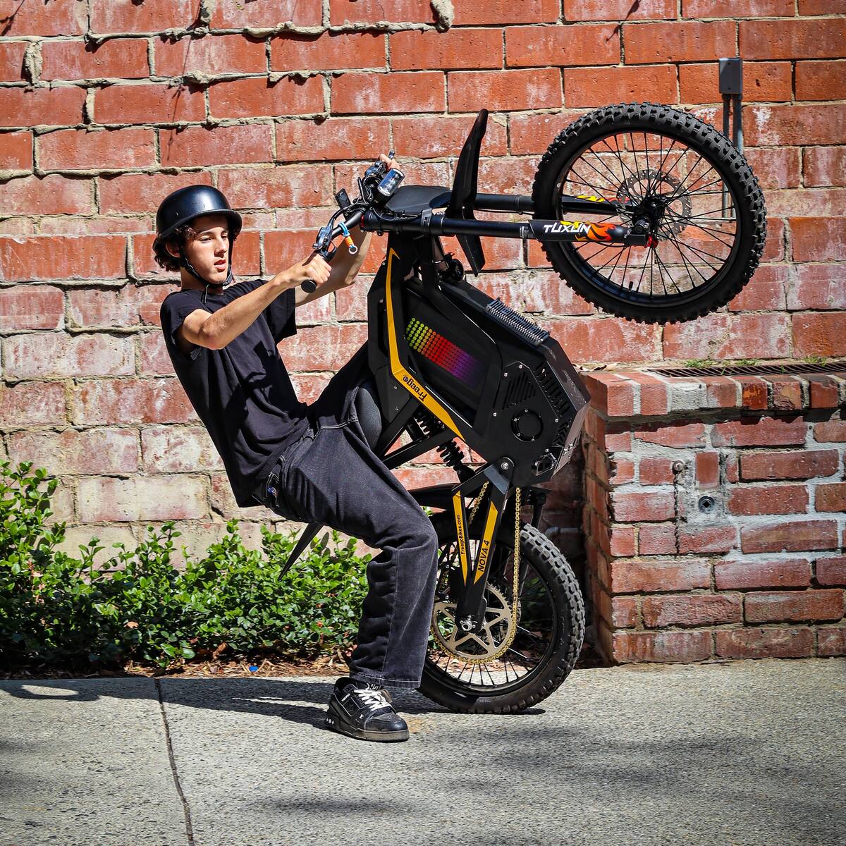 electric bicycle wheelie EBOX 2.0KW Pit bike By: Stomp REVRides Bikes is designed to provide optimal performance and durability Gold Coast Mayor Tom Tate