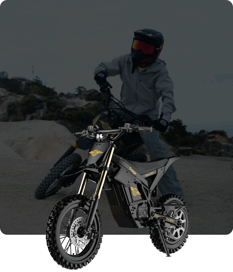 Person on a Freego Nova 5 Mini dirt bike in a desert-like environment