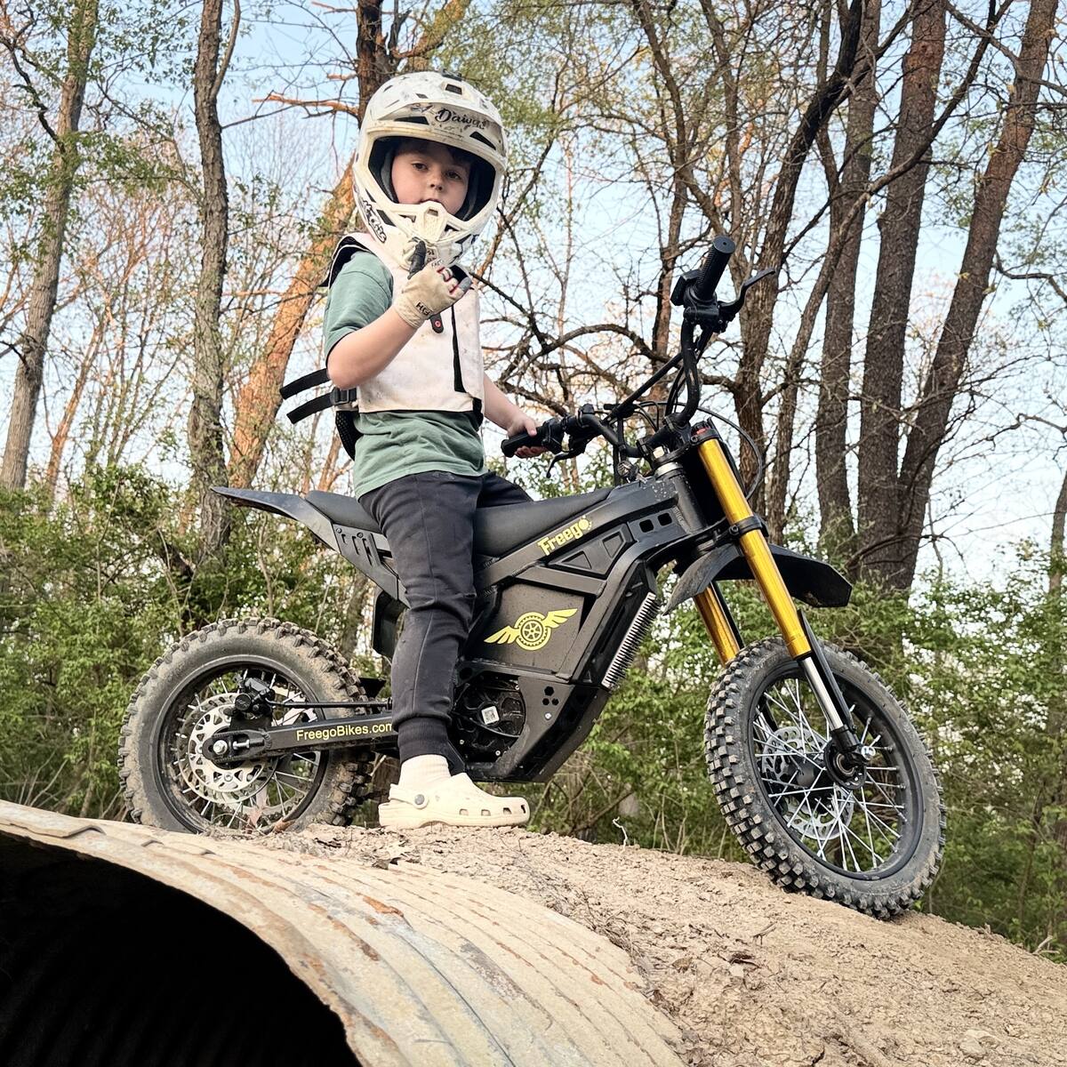 Freego Nova 5 mini electric bike with child rider portrait shot, photo by raittthis