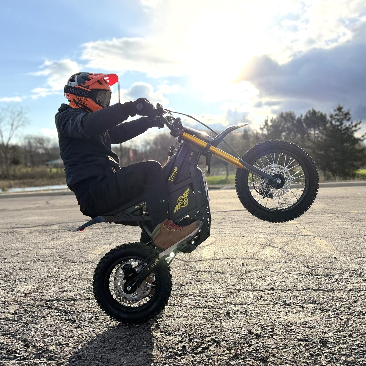 Freego Nova 5 mini electric bike child rider on dirt track, photo by runplayback