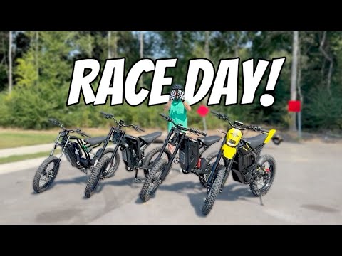 Four dirt bikes lined up on a road with 'RACE DAY!' text above.