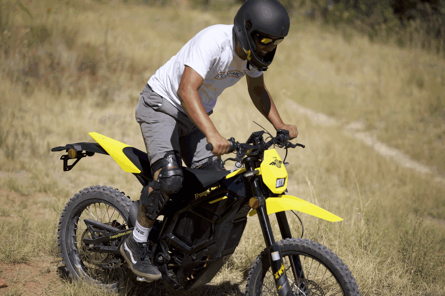 Freego Nova 5 off-road electric dirt bike in a offroad landscape, showcasing power and performance