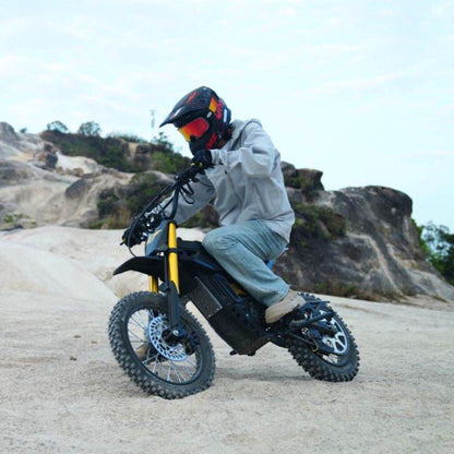 Freego Nova 5 Mini e-bike riding on a dirt trail in the outdoors