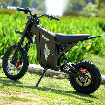 Freego X0 electric bike — full front-side view on grass lawn