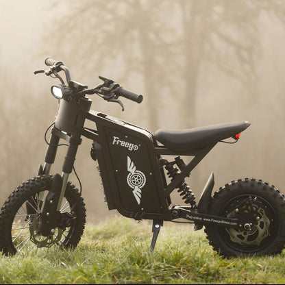 Freego X0 parked on a grassy field, showcasing its rugged off-road design and adventure-ready performance