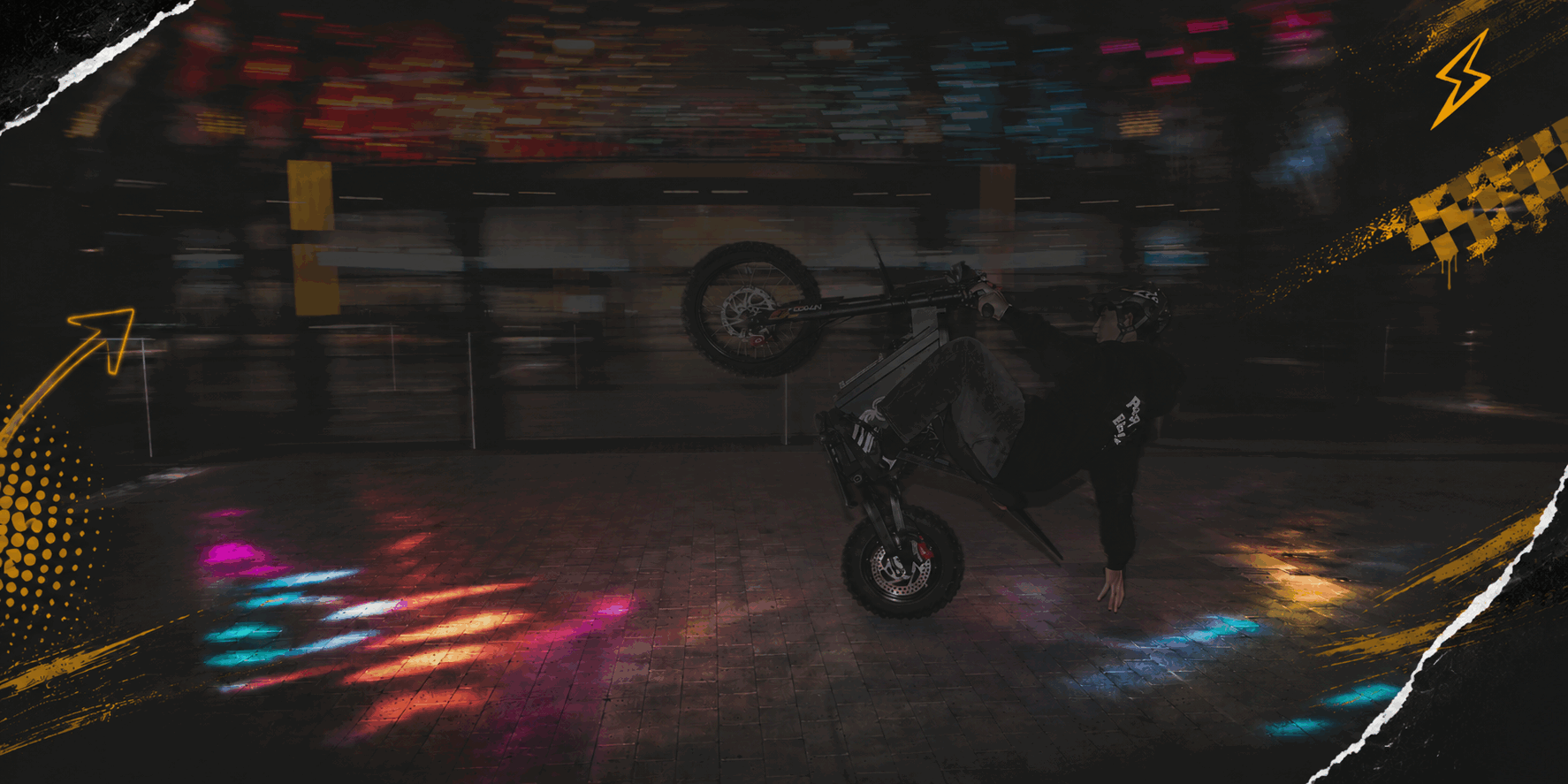 Freego X0 electric bike in an urban stunt scene with colorful neon lighting