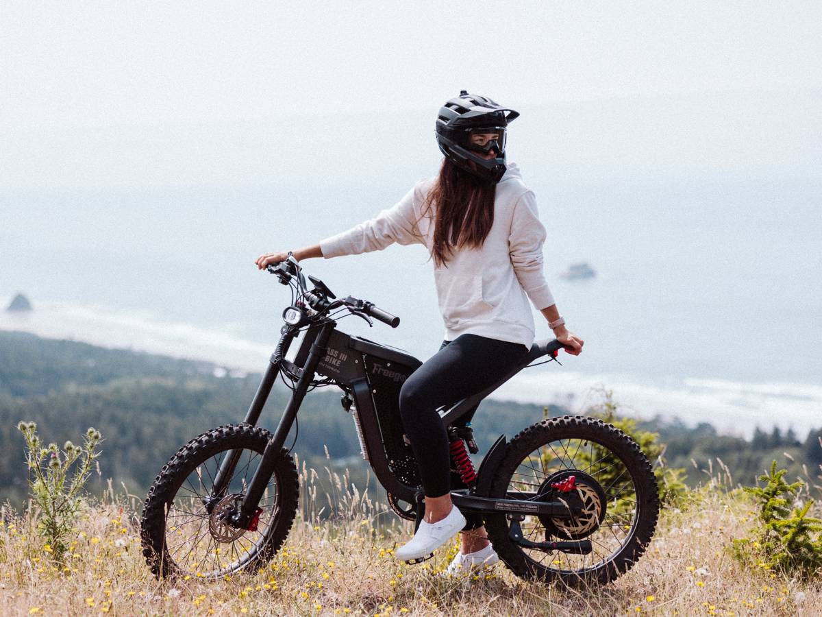 Freego X2 ebike viewed from the side on a beach.