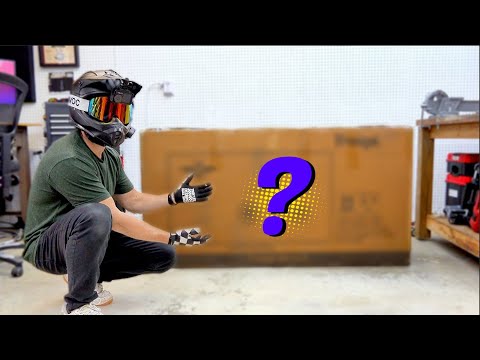 Person in a room with a large cardboard box and a question mark symbol